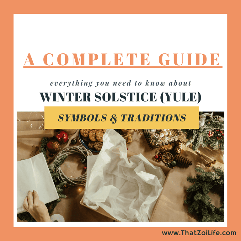 A table is laid out with various winter solstice symbols including evergreen branches, a wreath, pinecones, a giftbox and gingerbread cookies. Text reads "A complete guide: Everything you need to know about Winter Solstice (Yule) Symbols & Tradtitions"
